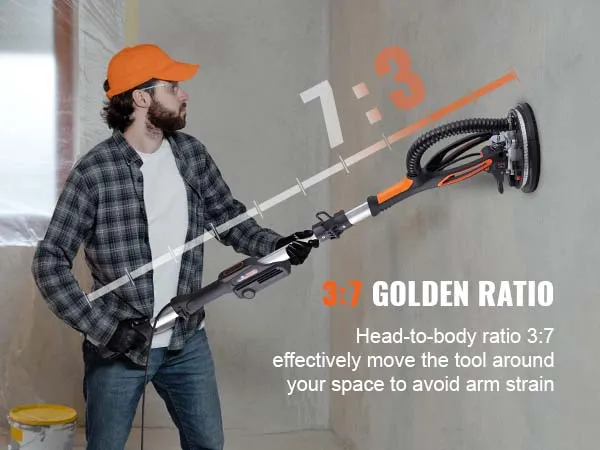 worker using VEVOR drywall sander with a 3:7 head-to-body ratio for efficient sanding on a wall.