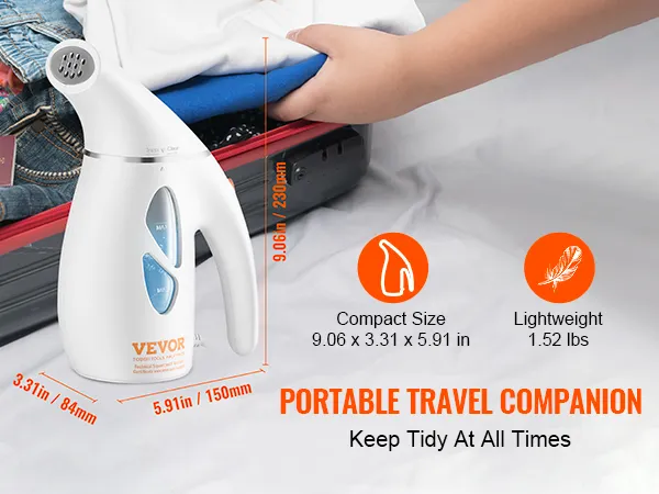 VEVOR handheld fabric steamer next to packed suitcase, showcasing compact size and lightweight design.