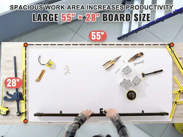 large 55" x 28" VEVOR standing desk top with tools, emphasizing spacious work area on wood surface.