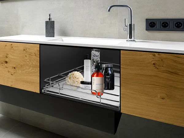 VEVOR pull out cabinet organizer with bath products in a modern bathroom cabinet.