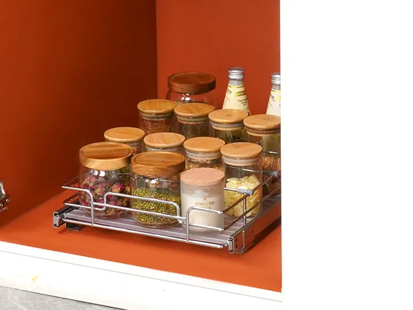 VEVOR pull out cabinet organizer with jars and bottles on an orange background inside a white cabinet.