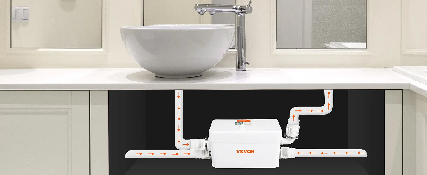 VEVOR macerator pump installed under bathroom sink with piping connections.