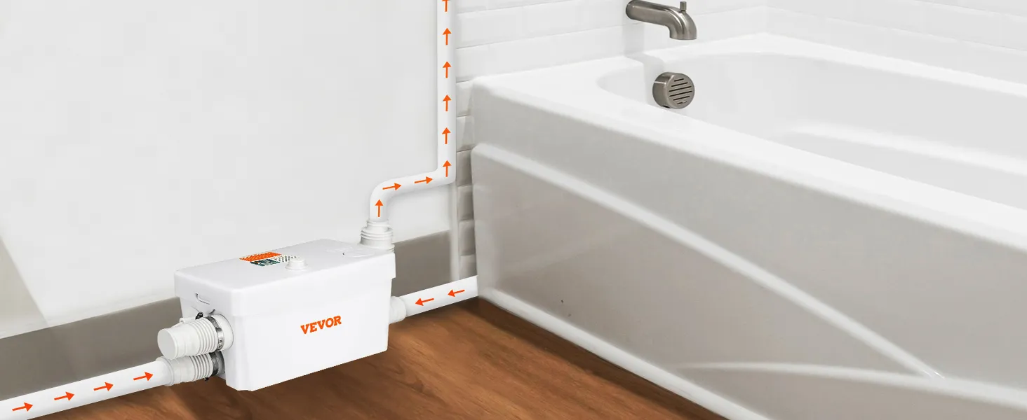 VEVOR macerator pump installed beside a white bathtub with arrows showing water flow direction.
