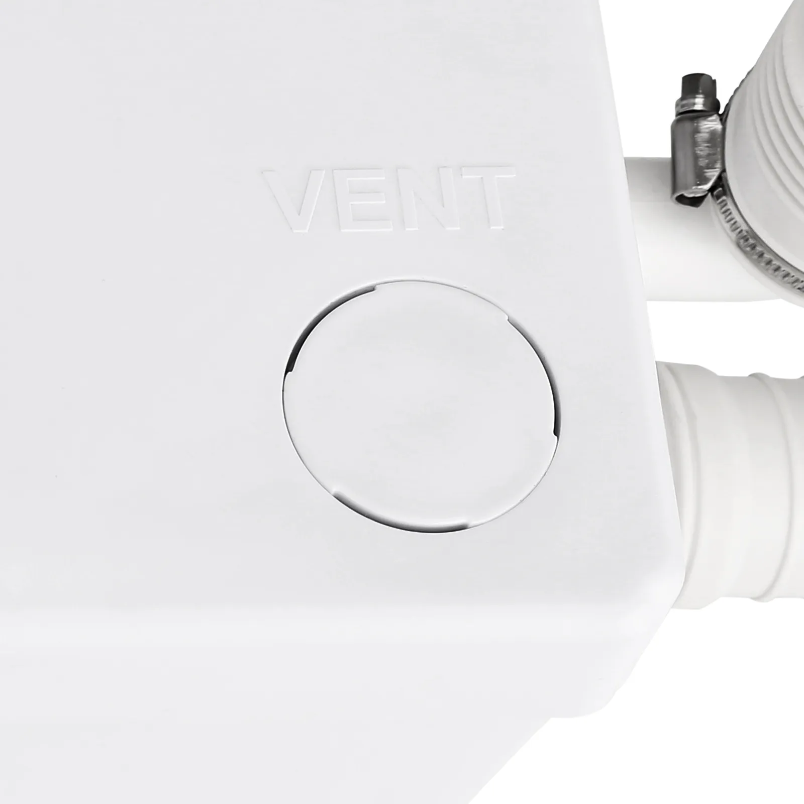close-up of a white VEVOR macerator pump vent port and attached pipe clamp.