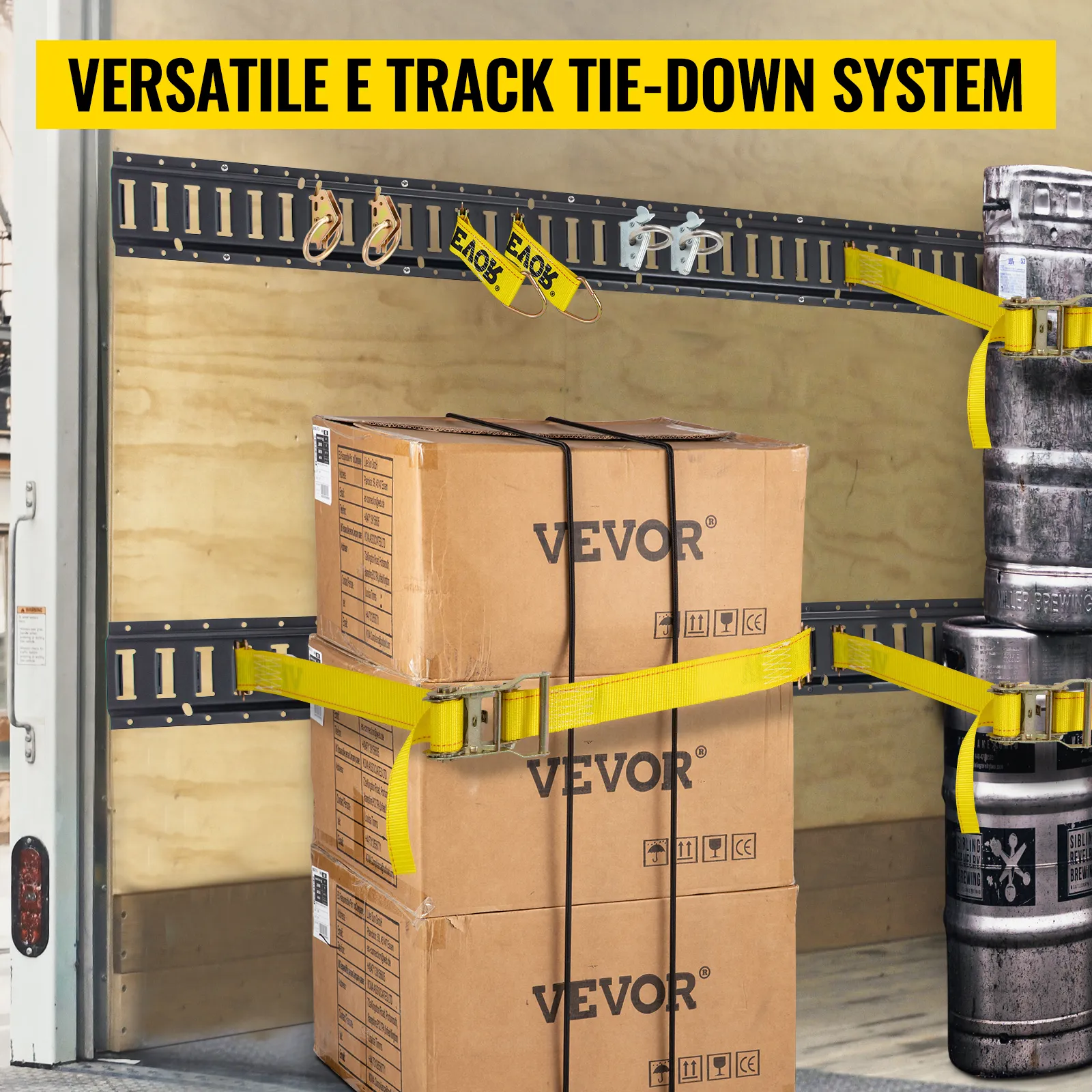 VEVOR e track tie-down kit securing boxes and barrels in a truck with yellow straps and e track rails.