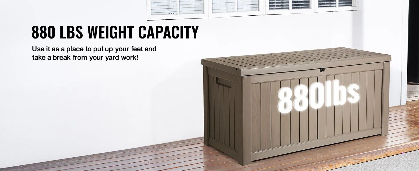 VEVOR deck box with 880 lbs weight capacity on a wooden deck next to a white wall.