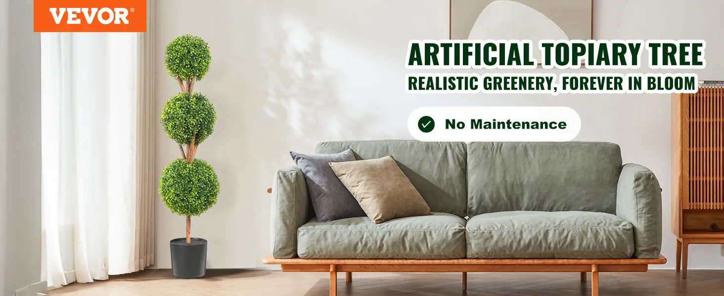 VEVOR artificial topiary tree beside green sofa with cushions in a cozy, modern living room.