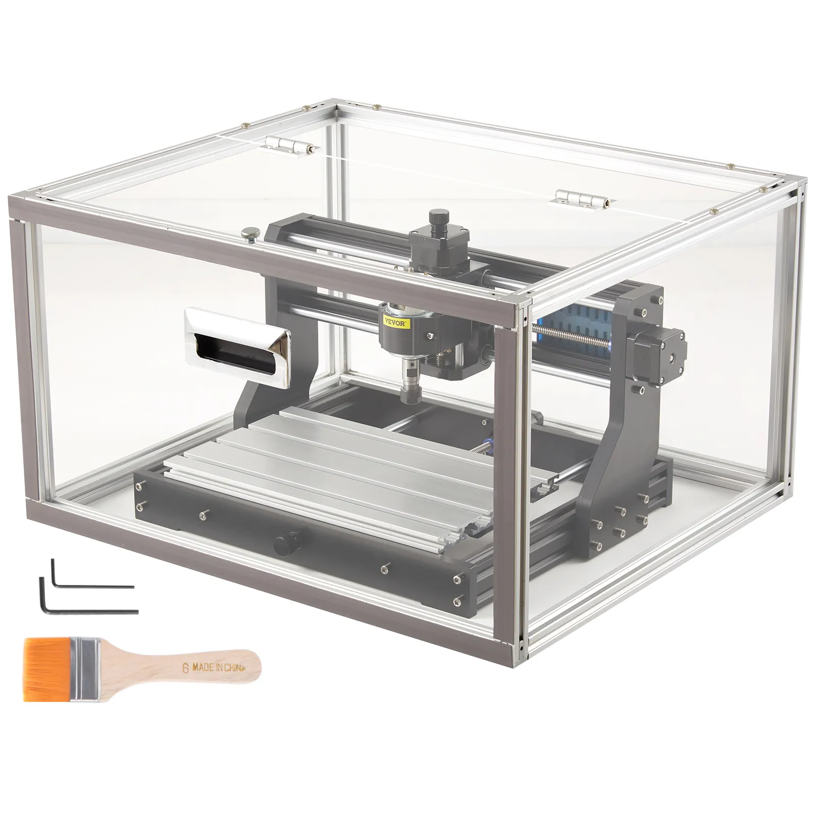 Máquina enrutadora CNC VEVOR en una carcasa transparente con herramientas y bloque de madera.