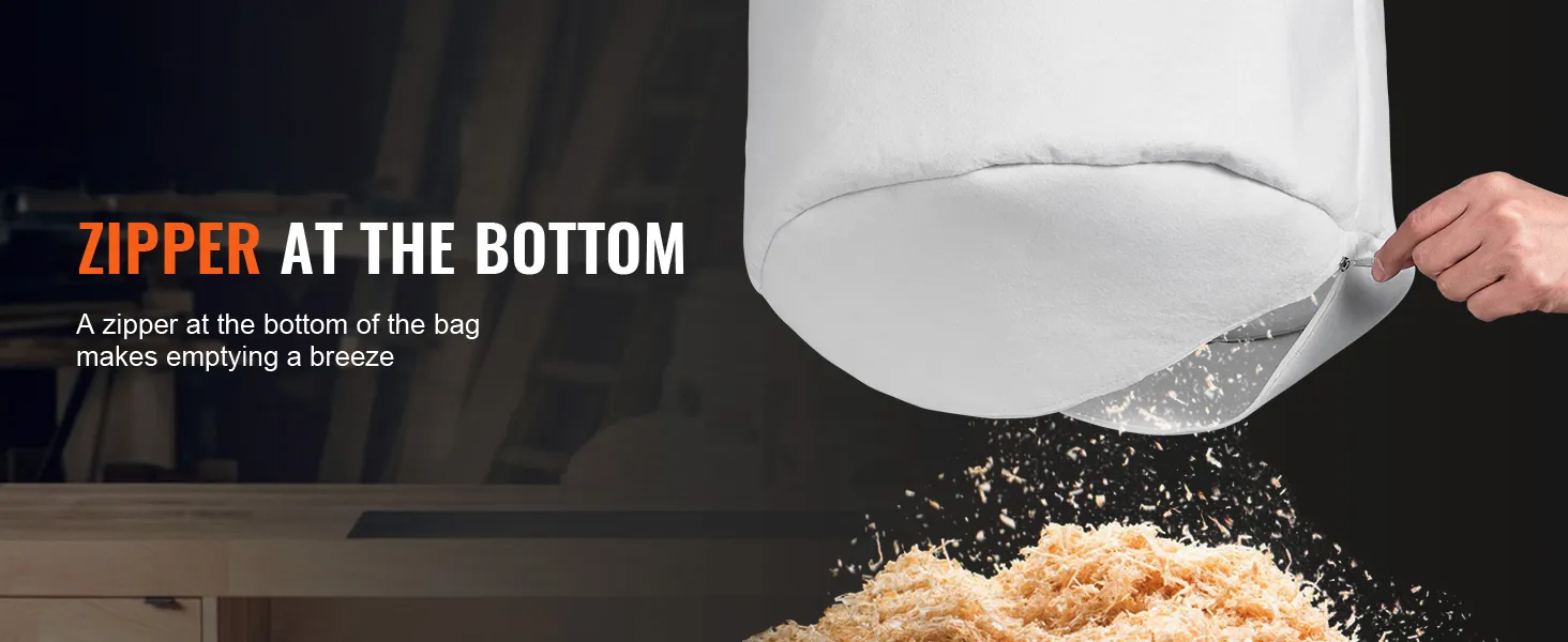 zipper at bottom of VEVOR dust collector bag being opened above a pile of wood shavings.