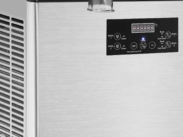 Panel de control de una máquina de granizados comercial VEVOR en acero inoxidable con pantalla digital y ajustes.