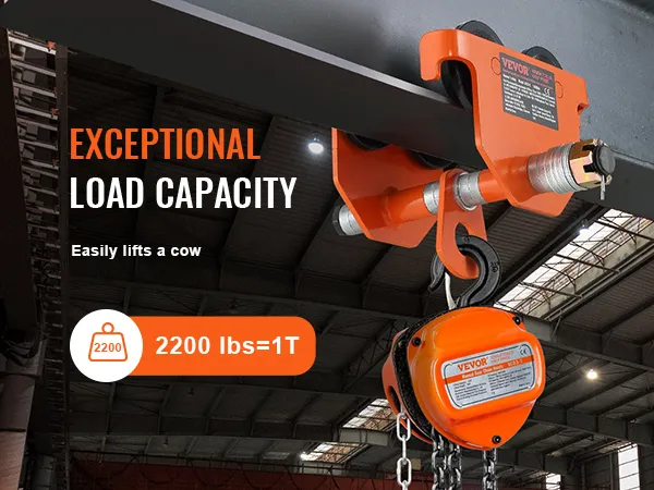 VEVOR manual trolley showcasing exceptional load capacity of 2200 lbs hanging in an industrial warehouse.