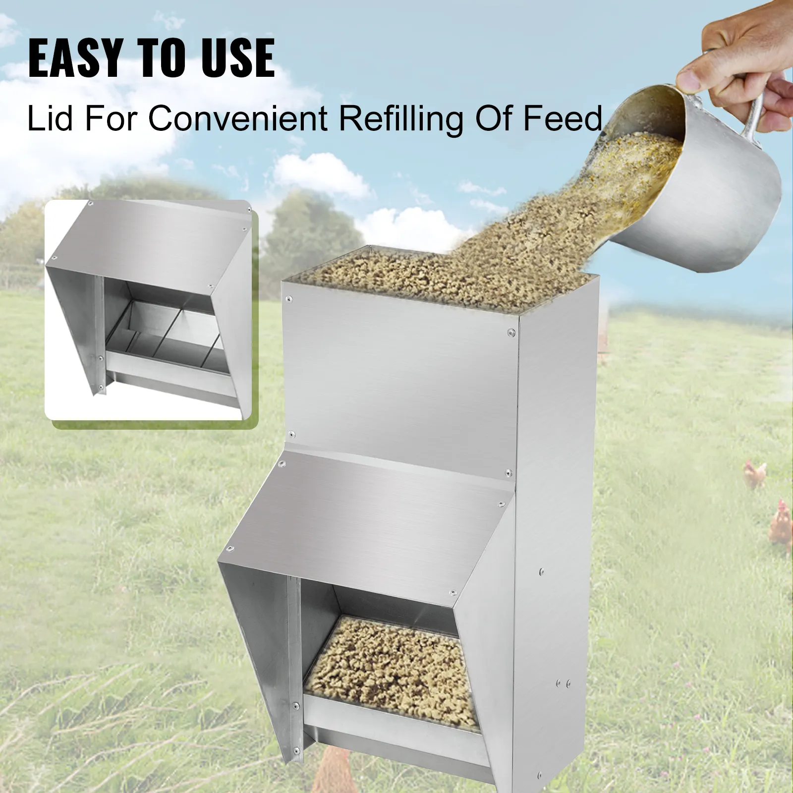 VEVOR galvanized poultry feeder being refilled with feed, lid open, in a field.