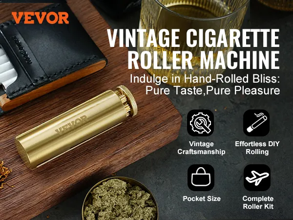 VEVOR cigarette rolling machine in brass finish on wood surface with tobacco, papers, and whiskey glass.