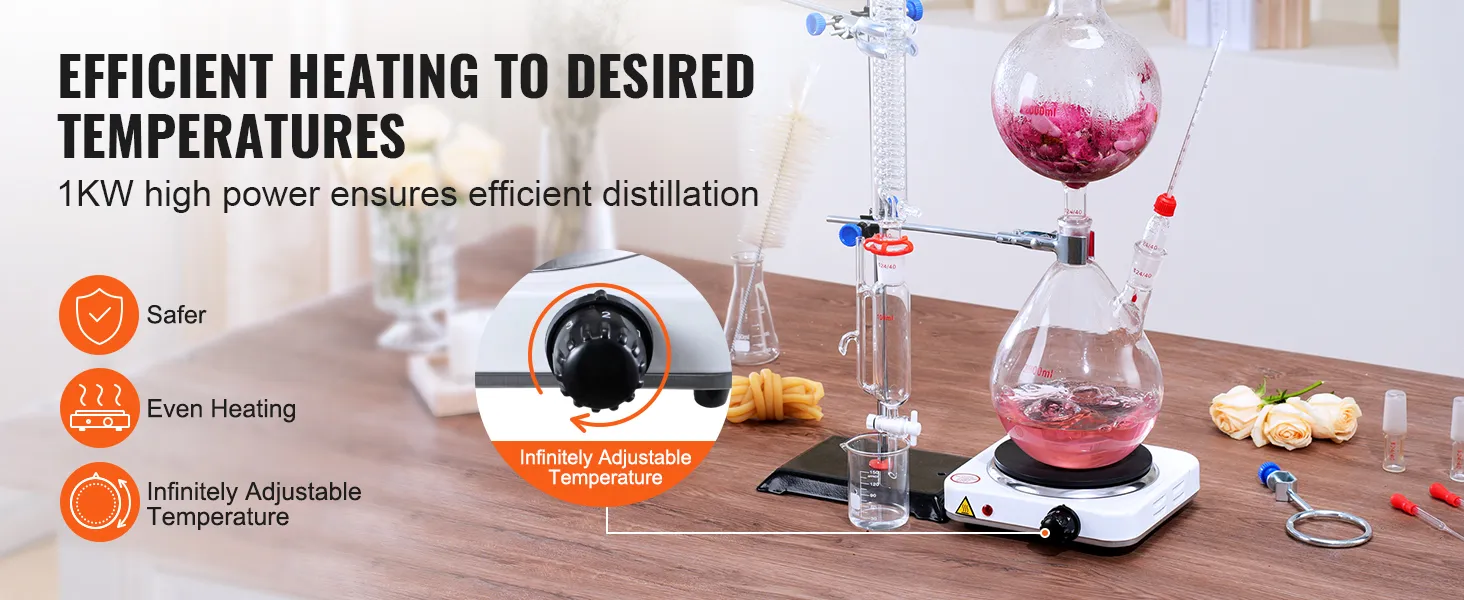 VEVOR-destillatieset voor essentiële olie op een tafel met veiligheids- en verwarmingsdiagram, glazen apparaat en instelbare temperatuur.