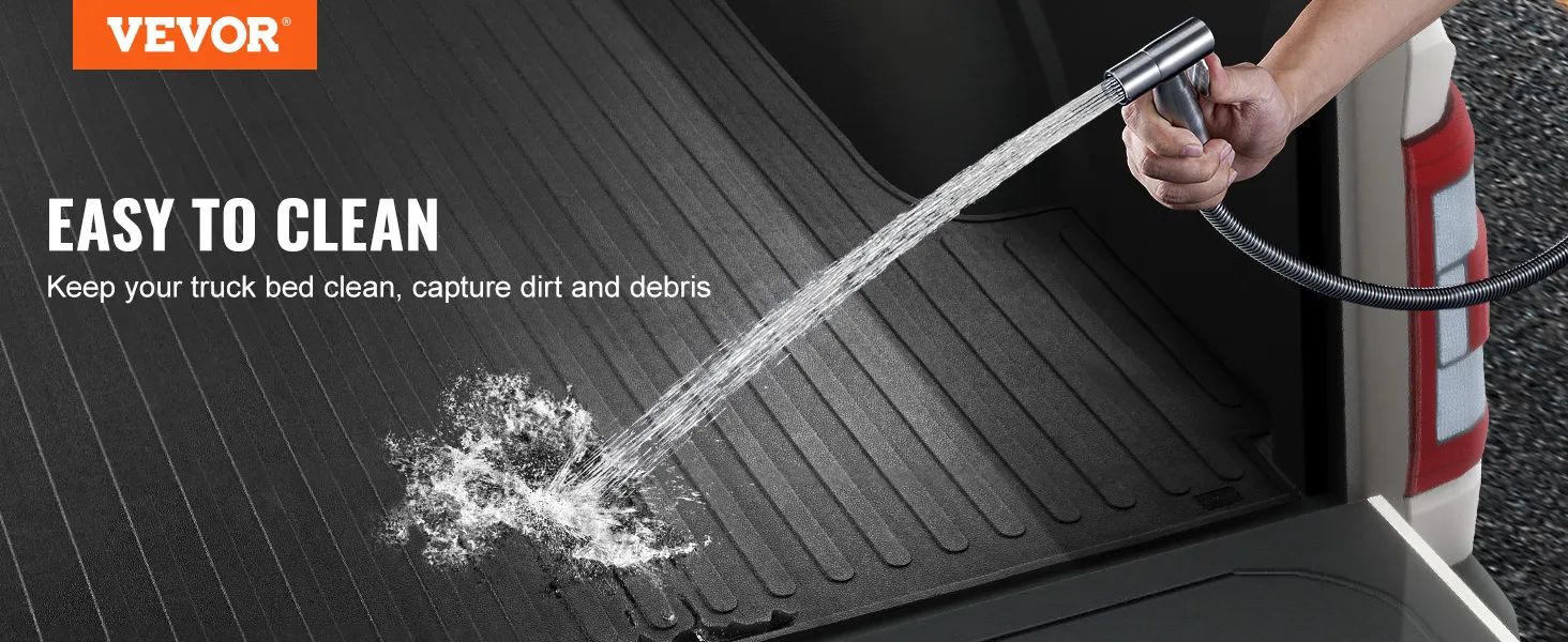 VEVOR truck bed mat being cleaned with a hose, showcasing its ease of maintenance.