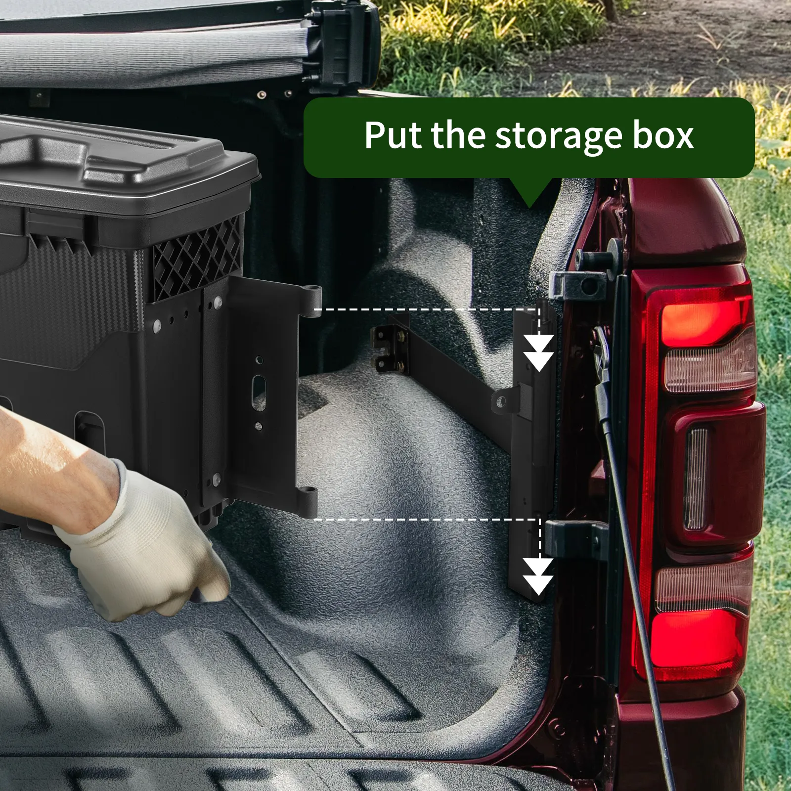 installation of VEVOR truck bed storage box in a red truck's bed with gloved hand for placement.
