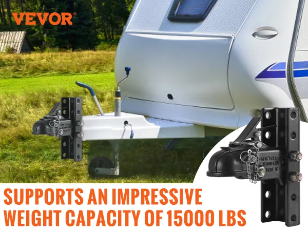 VEVOR adjustable trailer coupler attached to a travel trailer in a grassy field with a weight capacity of 15000 lbs.