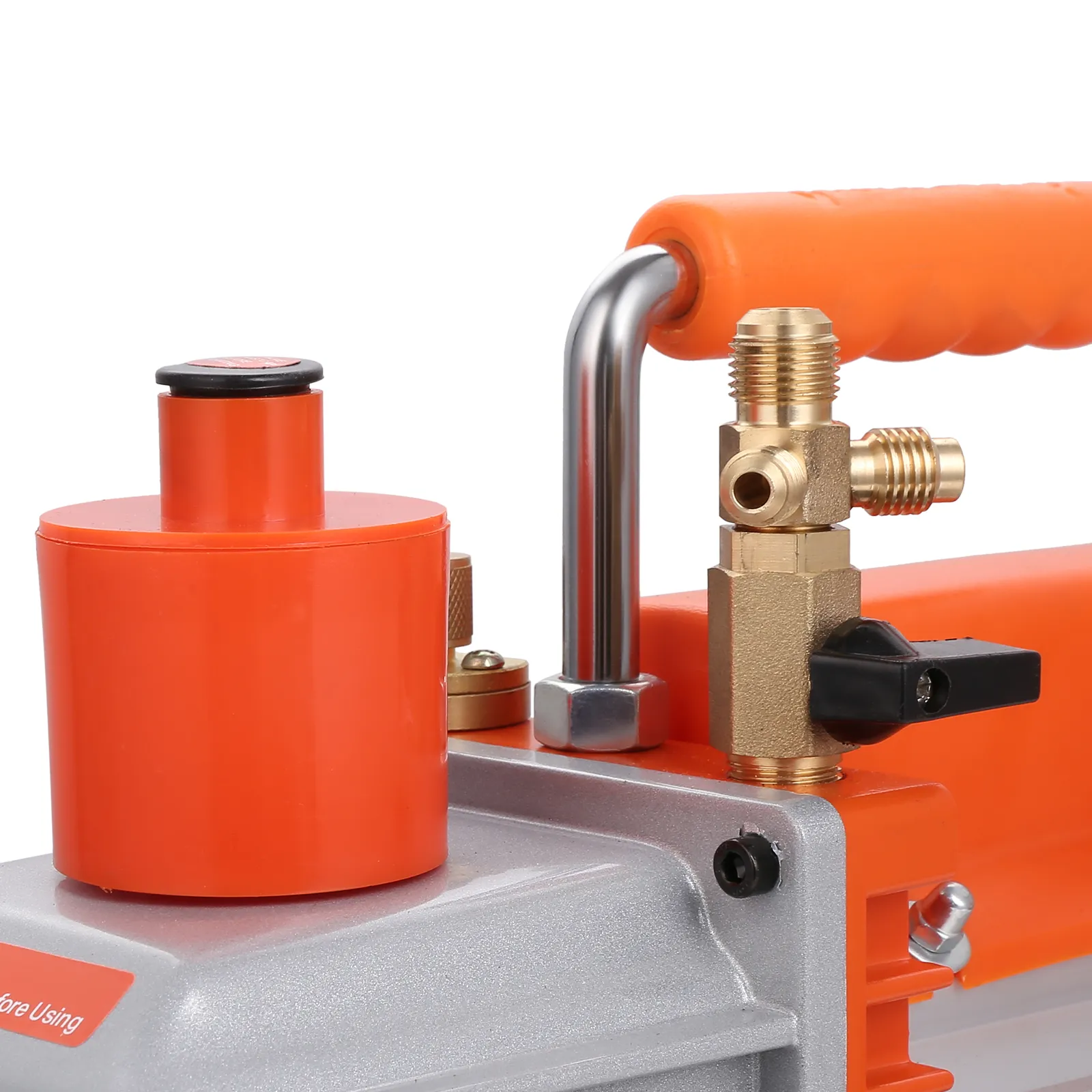 close-up of VEVOR hvac vacuum pump with orange handle and brass fittings.
