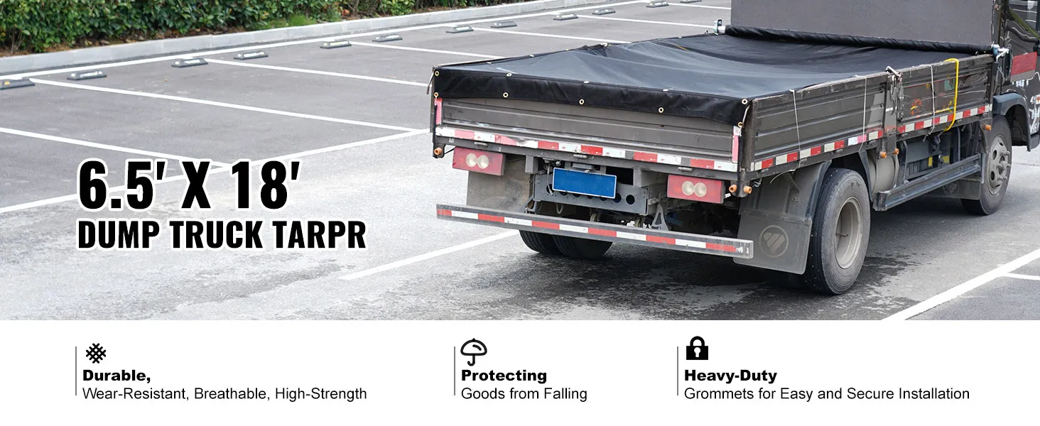 6.5' x 18' black VEVOR dump truck mesh tarp protecting goods, installed on a truck in a parking lot.