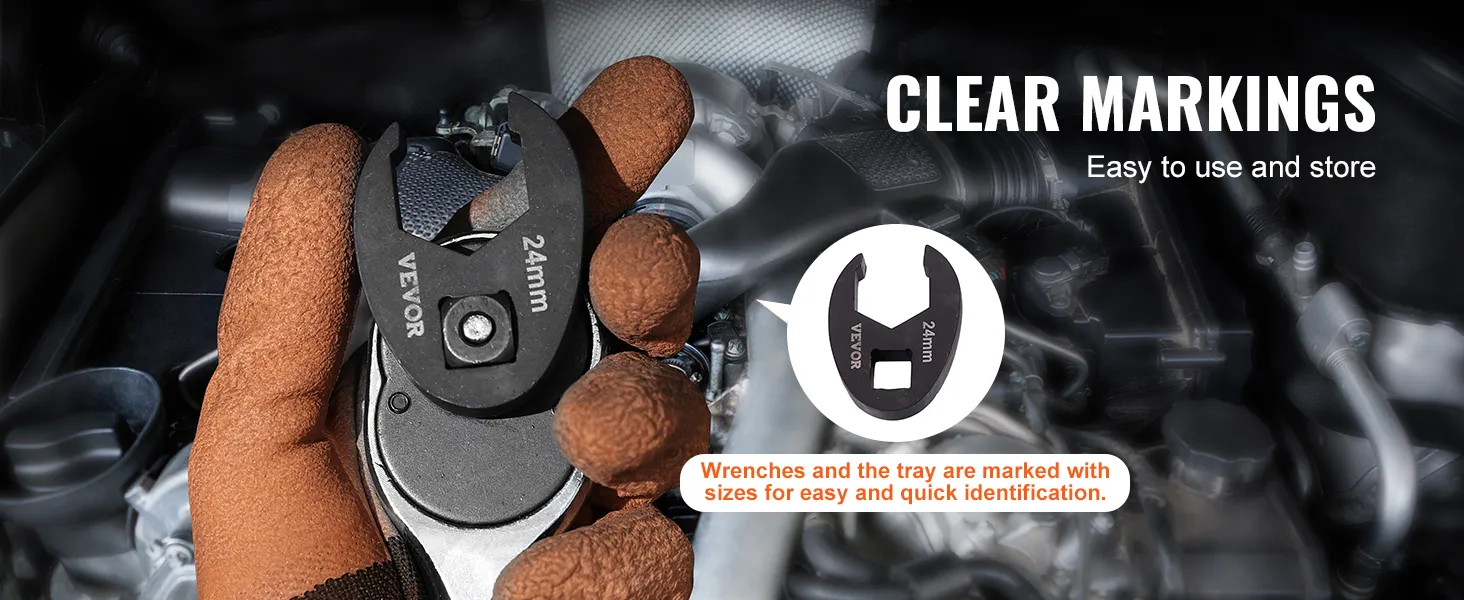 gloved hand holding a 24mm VEVOR crowfoot wrench with clear size markings for easy identification.