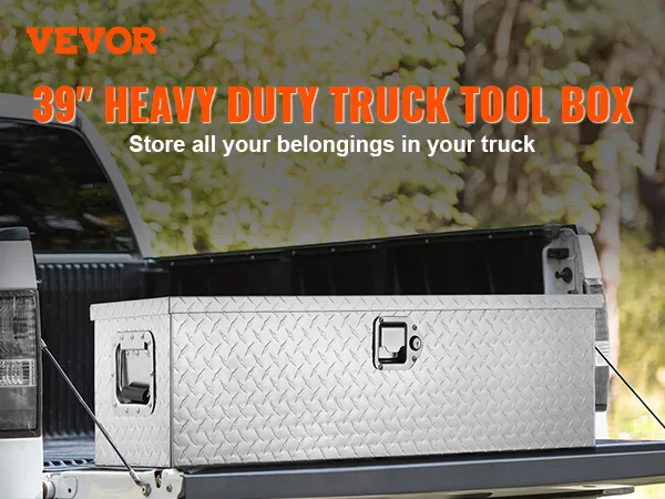 VEVOR truck bed tool box on white truck with open tailgate, forest background, store belongings securely.