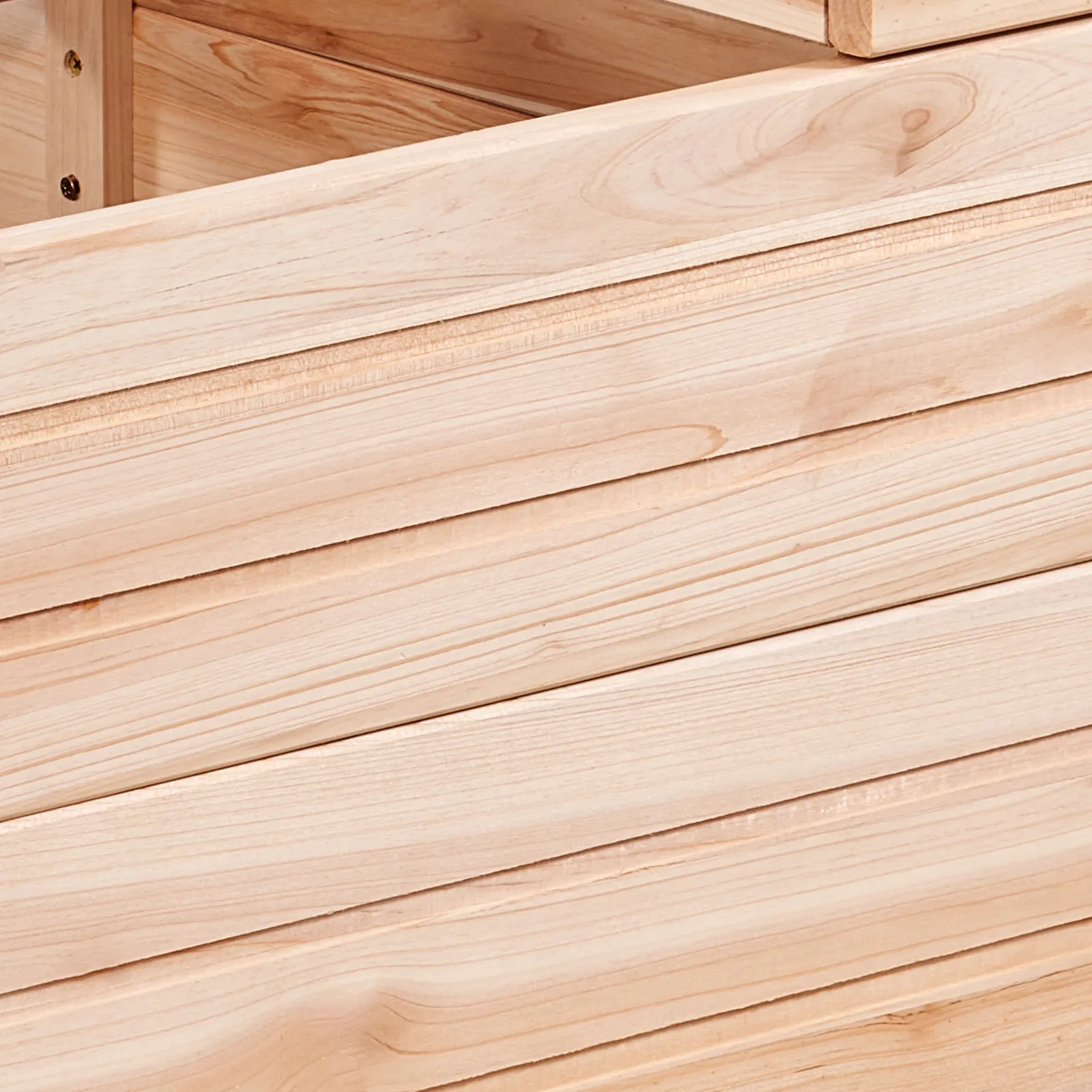 close-up view of VEVOR raised garden bed made of light wood with visible grain patterns.