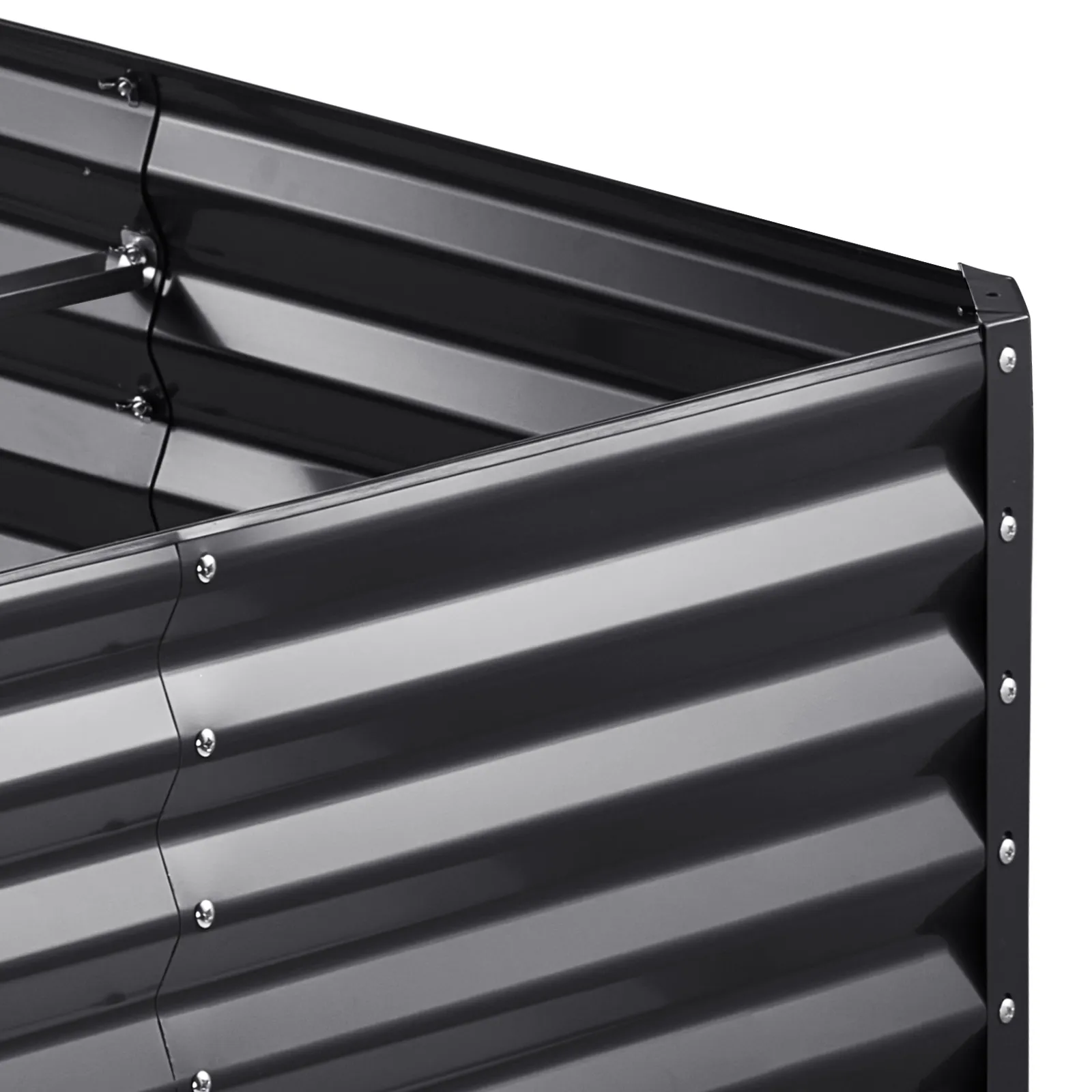 VEVOR garden bed with corrugated black steel panels and secure silver bolts on the corners and edges.