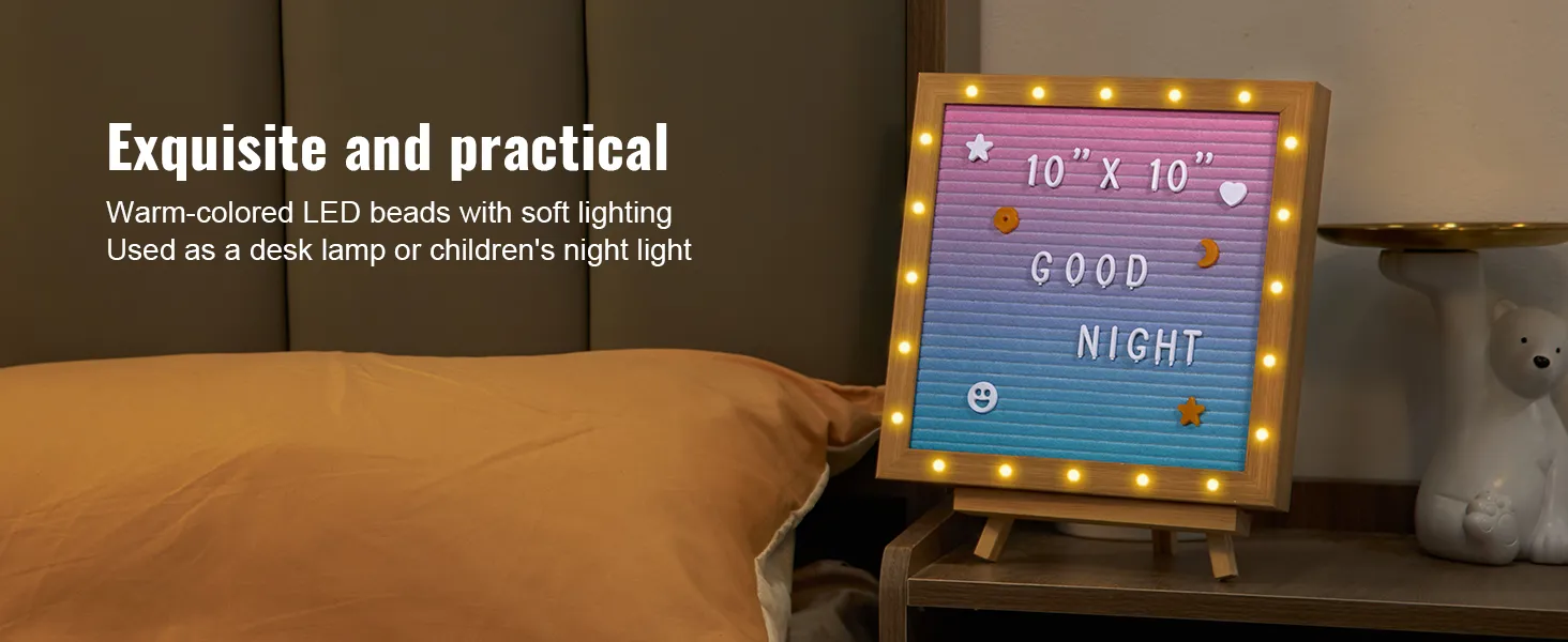 Tablero de letras de fieltro VEVOR con luces LED cálidas sobre una mesita de noche, que muestra "buenas noches".
