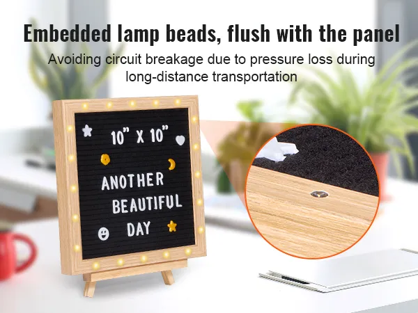 Tablero de letras de fieltro VEVOR con cuentas de lámpara incrustadas, que muestra "otro hermoso día" en un escritorio.