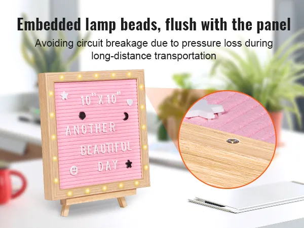 VEVOR pink felt letter board with embedded lamp beads, wooden frame, and customizable letters on a desk.