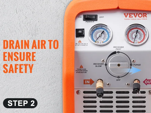 orange and silver VEVOR refrigerant recovery machine panel with "drain air to ensure safety" instructions.