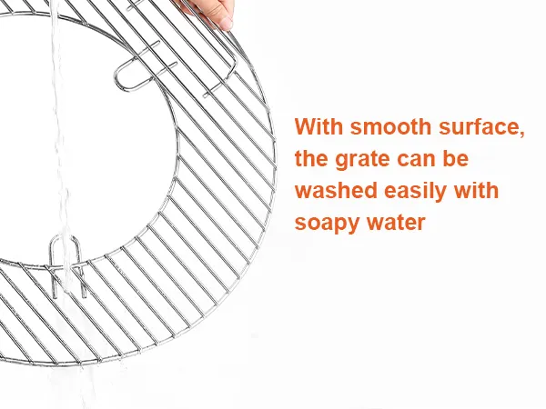 hands washing a VEVOR cooking grate with soapy water, featuring smooth, easy-to-clean surface.