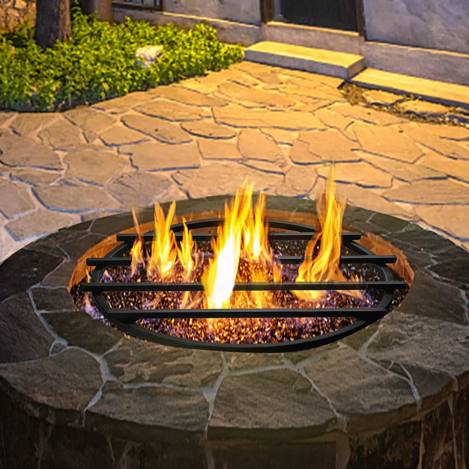 VEVOR fire pit grate with glowing flames on a stone patio background.