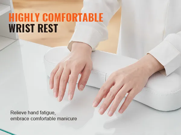 Manos descansando sobre un cómodo soporte para muñecas para la mesa de manicura VEVOR.