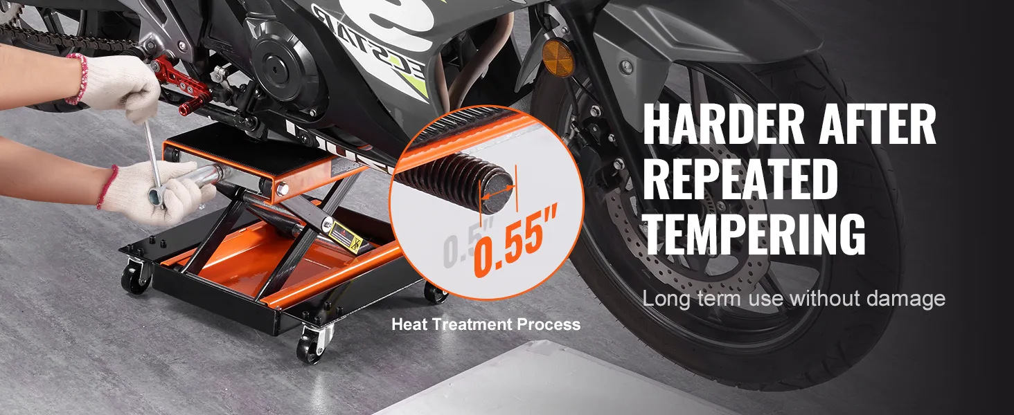 mechanic using VEVOR motorcycle lift for bike maintenance with focus on heat-treated component.
