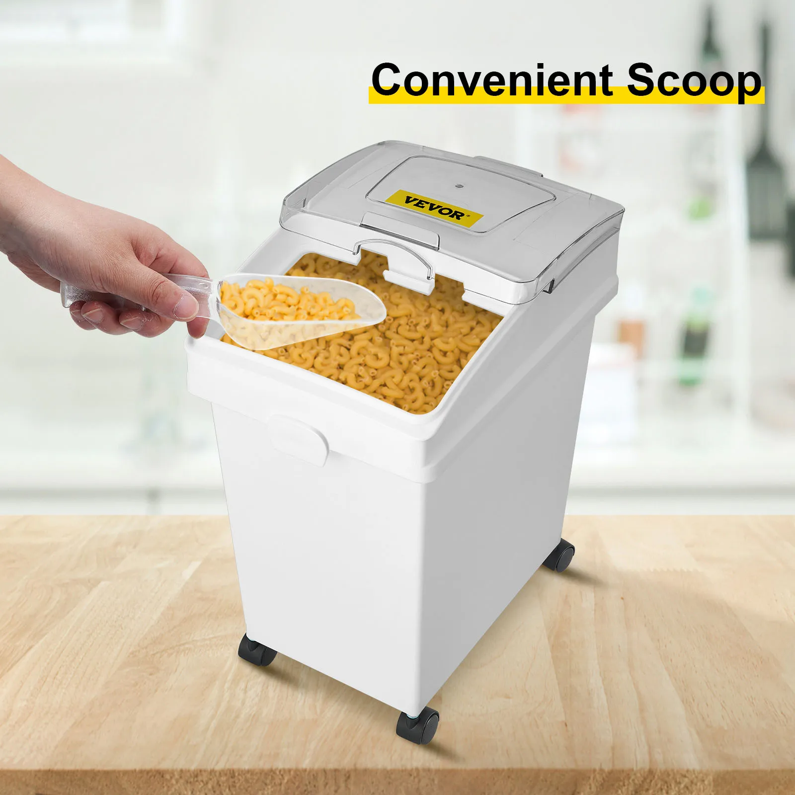 hand scooping pasta from a VEVOR ingredient bin on a kitchen counter.