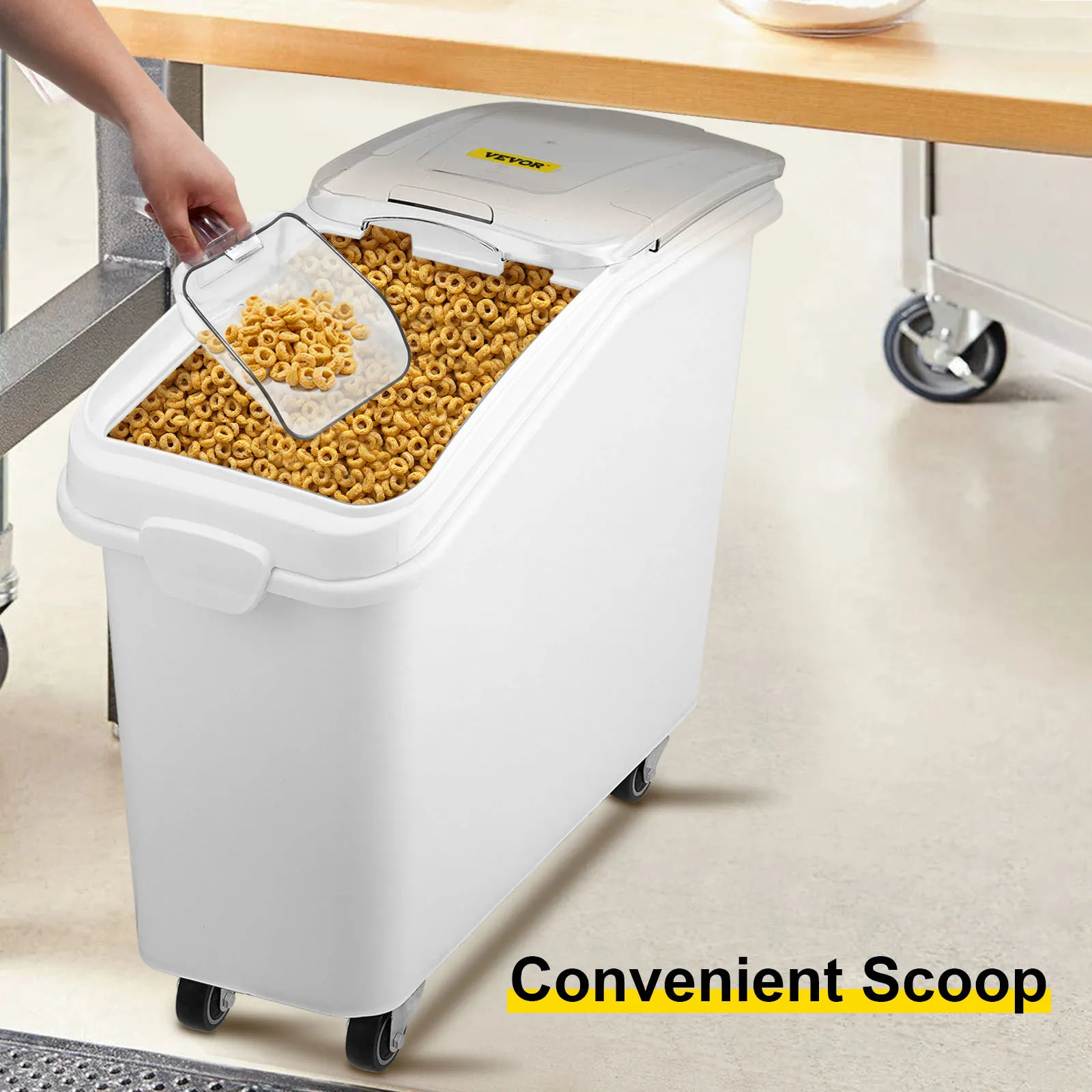 scooping cereal from a VEVOR ingredient storage bin in a kitchen.