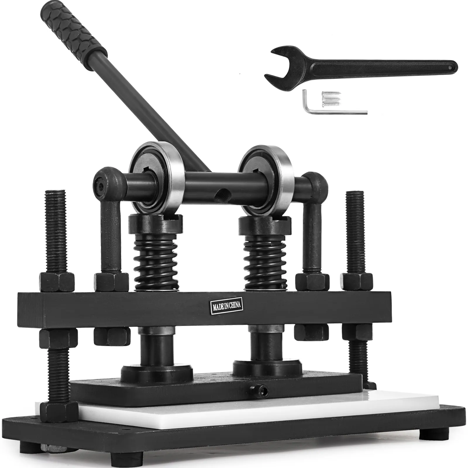VEVOR leather cutting machine with handle and included wrench.