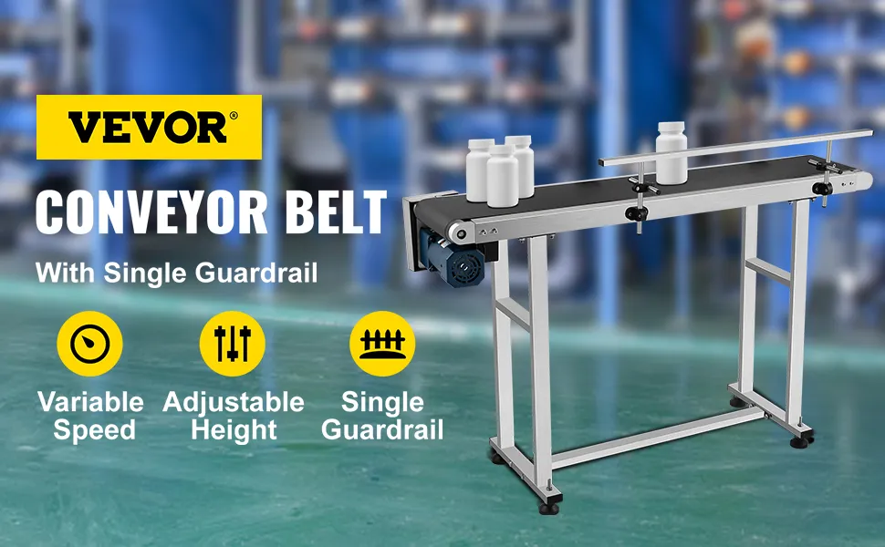 Transportador de banda VEVOR con altura regulable y barandilla simple en un almacén.