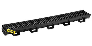 VEVOR trench drain system with black plastic grate and yellow logo.