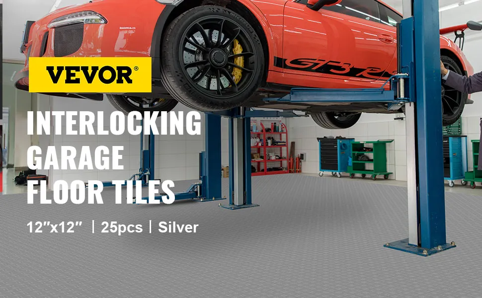 Azulejos de garaje VEVOR exhibidos en un taller con un automóvil en un elevador. 12 "x 12", 25 piezas plateadas.