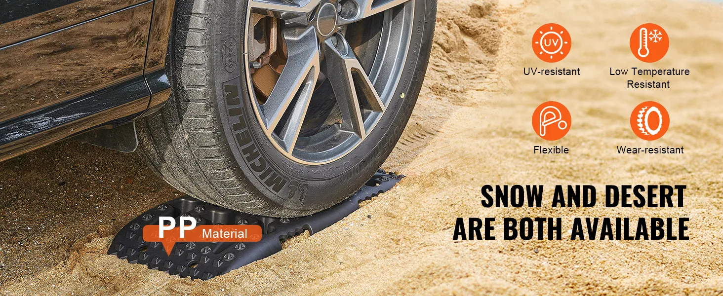 Rueda de automóvil sobre tablas de tracción VEVOR en arena, destacando la resistencia a los rayos UV, la flexibilidad y la resistencia al desgaste.