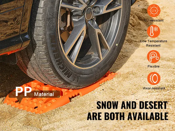 Tablas de tracción VEVOR debajo de un neumático de automóvil sobre arena, que muestran resistencia a los rayos UV, a las bajas temperaturas y al desgaste.