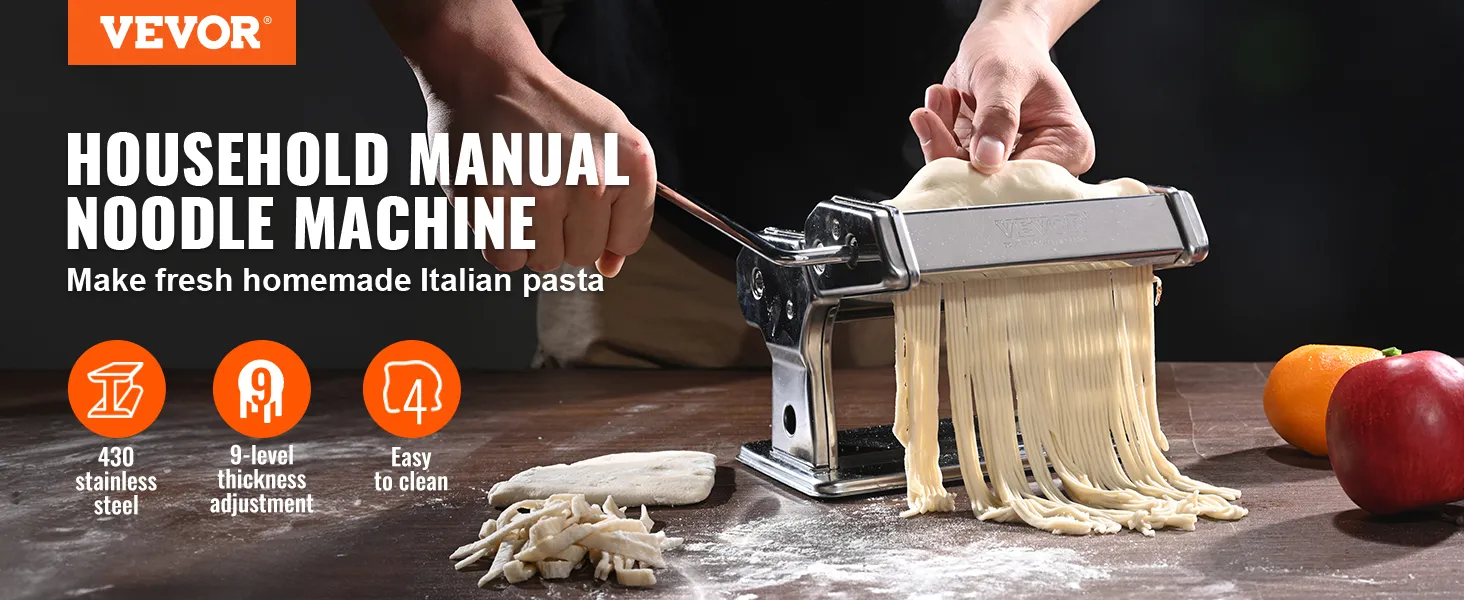 VEVOR pasta maker in use, making fresh noodles on a wooden table with fruits in the background.