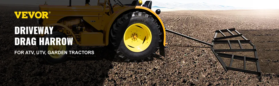 Rastra de entrada para vehículos VEVOR unida a un tractor amarillo en un vasto campo arado.