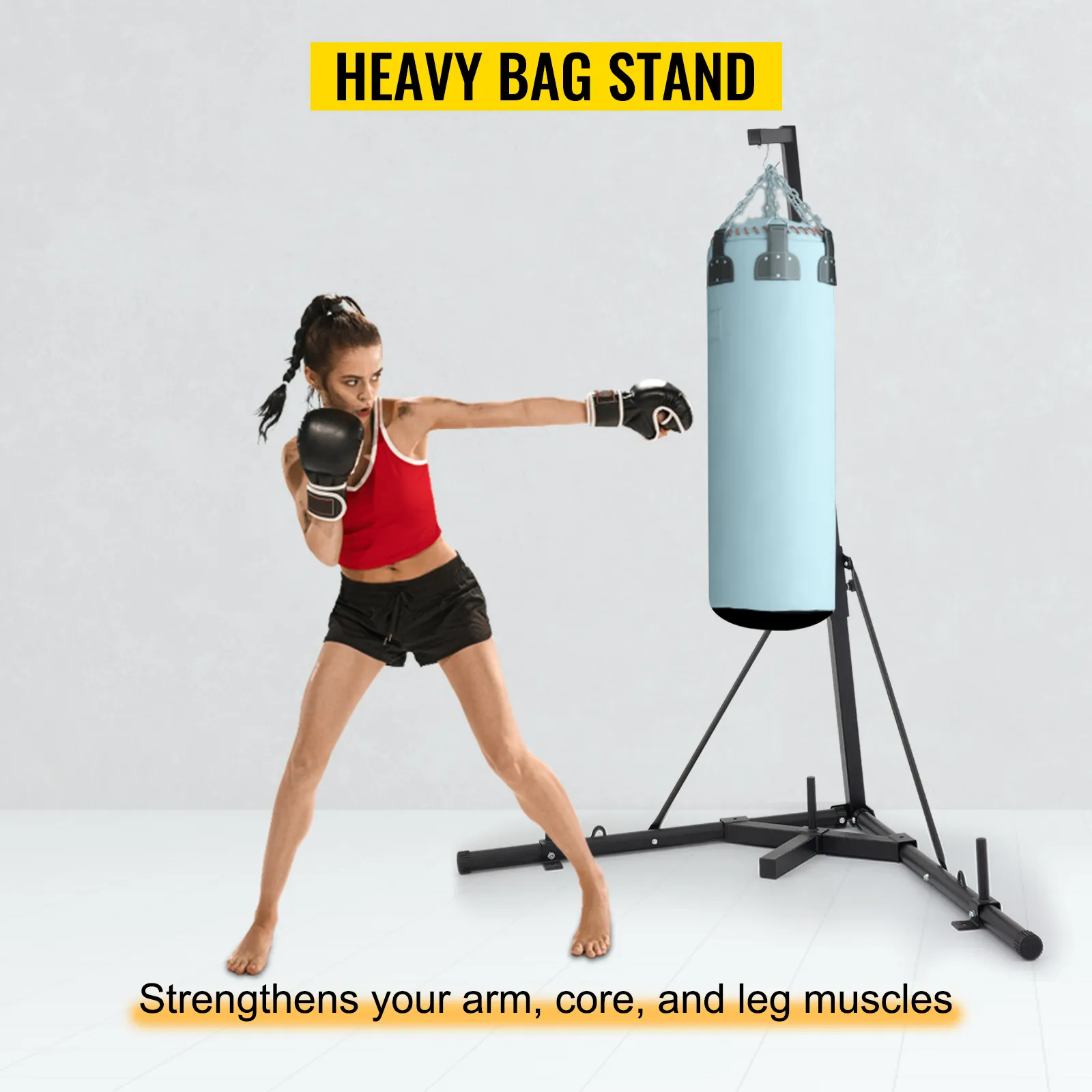 trening boksera ze stojakiem na worek treningowy VEVOR w tle.