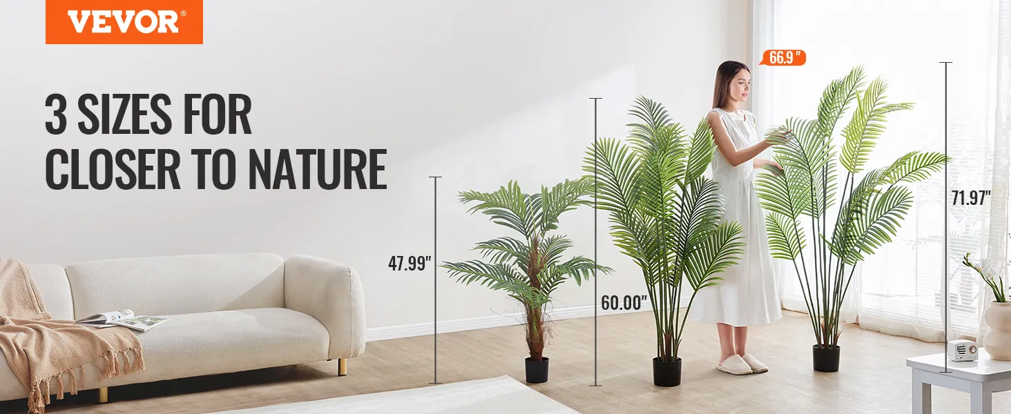3 sizes of VEVOR artificial palm tree displayed beside a couch in a bright, modern room.