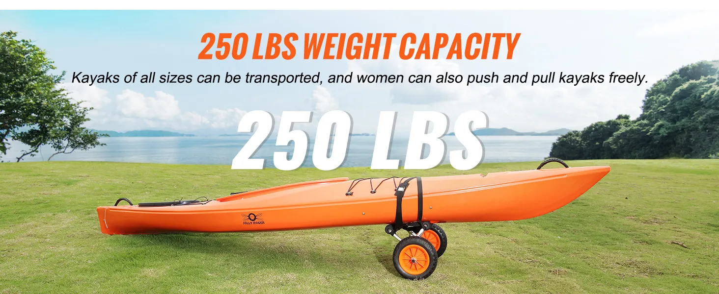 Kayak arancione brillante su carrello per kayak VEVOR, capacità di carico di 250 libbre, campo erboso con acqua sullo sfondo.