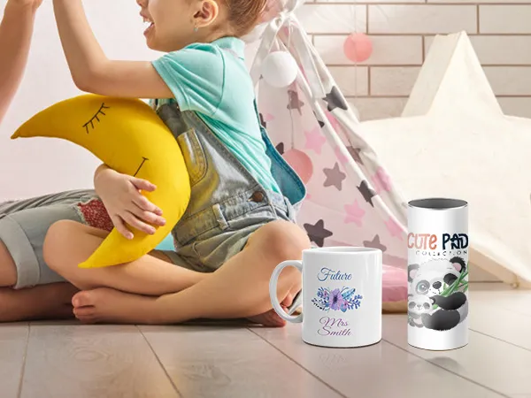 children playing with star and moon pillows, accompanied by custom mugs made with VEVOR tumbler heat press.