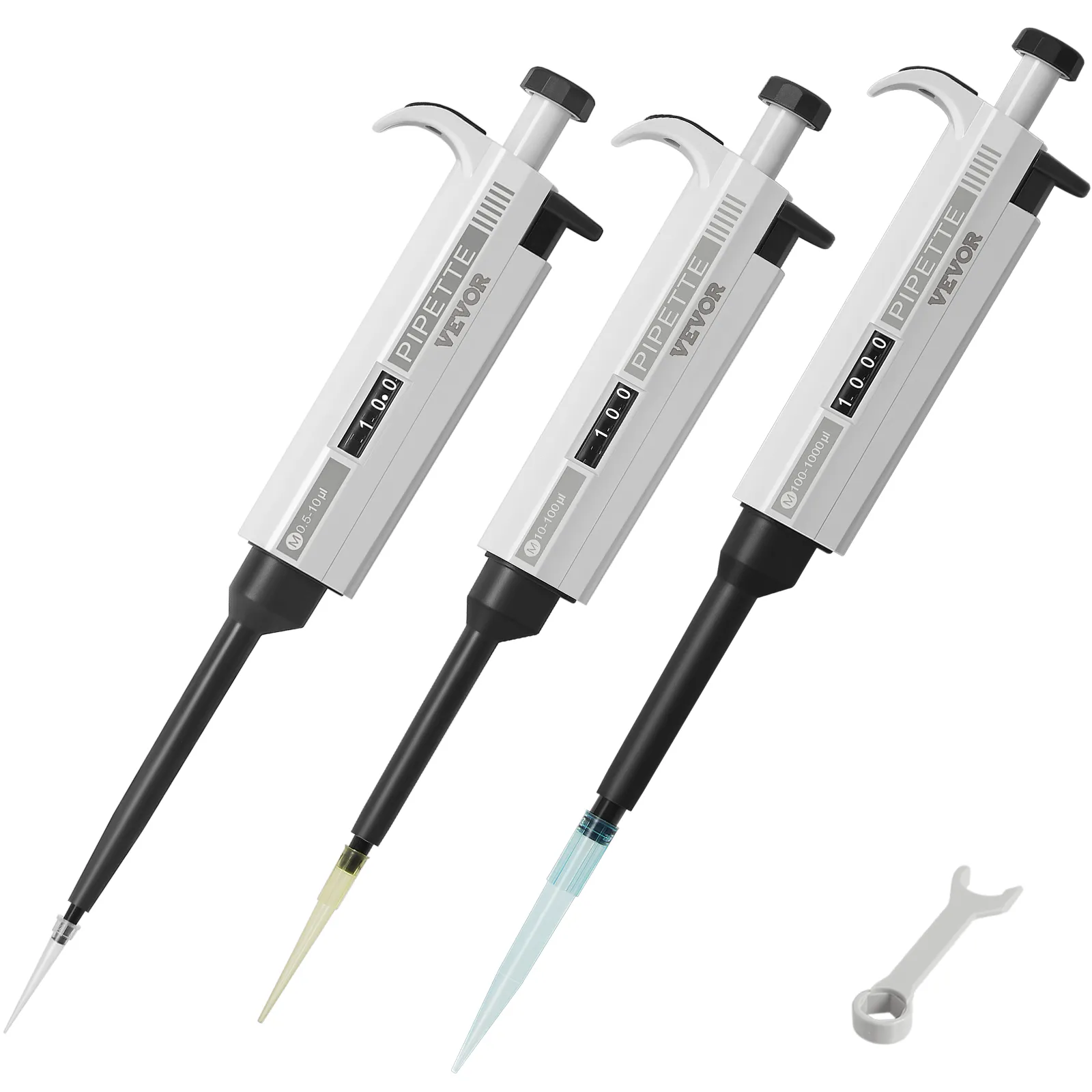 VEVOR lab micropipette kit with three adjustable micropipettes and wrench against white background.